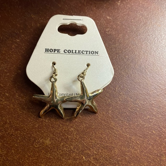 Star shape dangling gold overlay earrings - Picture 1 of 2